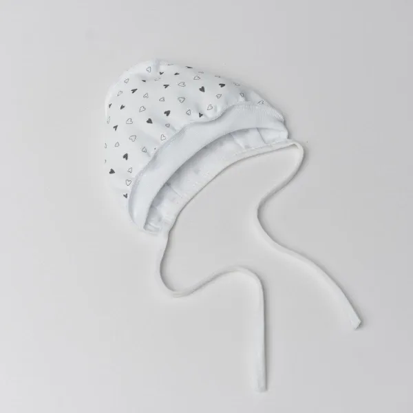 Vilaurita cepurīte ar ārējām šuvēm 1018 "Sirsniņas" 38, 40 cm.